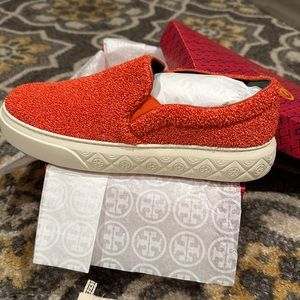 Tory Burch Ladybug slip on sneakers.